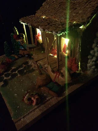Illustration for article titled Amazing Ash vs Evil Dead Gingerbread House Is the Grooviest Reason for the Season